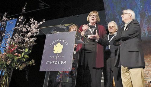 Sue Horstmann accepts the 2017 Lifetime Achievment Award presented by David Adelsheim and Harry Peterson-Nedry at the Oregon Wine Symposium at the Oregon Convention Center in Portland. ##Photo by Carolyn Wells Kramer &nbsp;