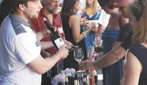 Alex Fullerton pours his eponymous brand to guests at the recent PDX Urban Wineries event.Photo by Jade Helm