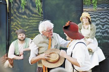 In last year’s “A Midsummer Night’s
Dream,” actors (from left) Chet Wilson, Jim Halliday, Nathan Dunkin and Anna Gettles play “the mechanicals,” the acting troupe within the play. Photo by Karen Halliday. In last year’s “A Midsummer Night’s
Dream,” actors (from left) Chet Wilson, Jim Halliday, Nathan Dunkin and Anna Gettles play “the mechanicals,” the acting troupe within the play. Photo by Karen Halliday.