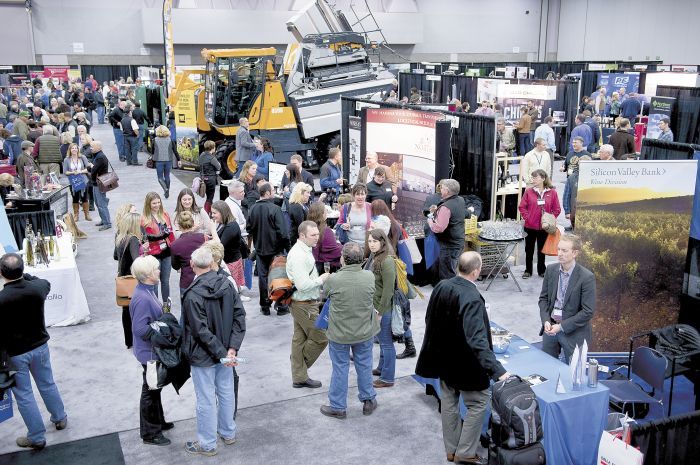 Attendees stroll through the 2014 Oregon Wine Symposium trade show held at the Convention Center in Portland.Photo by Carolyn Wells-Kramer Attendees stroll through the 2014 Oregon Wine Symposium trade show held at the Convention Center in Portland.Photo by Carolyn Wells-Kramer