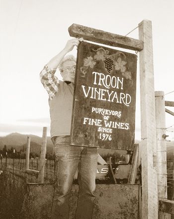 A young Dick Troon hangs a winery sign in 1976 at his Applegate Valley vineyard.
Photo provided. A young Dick Troon hangs a winery sign in 1976 at his Applegate Valley vineyard.
Photo provided.