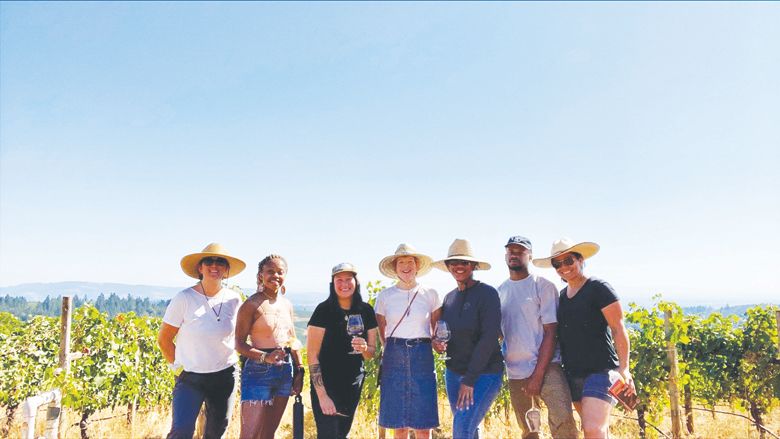 Our Legacy Harvested interns with staff members during the harvest. From left: Elaine Heide, head of OLH education programming; Raven Blake, OLH intern; Ocean Yap-Powell, assistant at OLH; Paige Knudsen, Dr. Kimberley Dockery, owner of Knudsen Vineyard; Denzel Green, OLH intern; and Marcela Alcantar-Marshall, OLH intern.##Photo provided