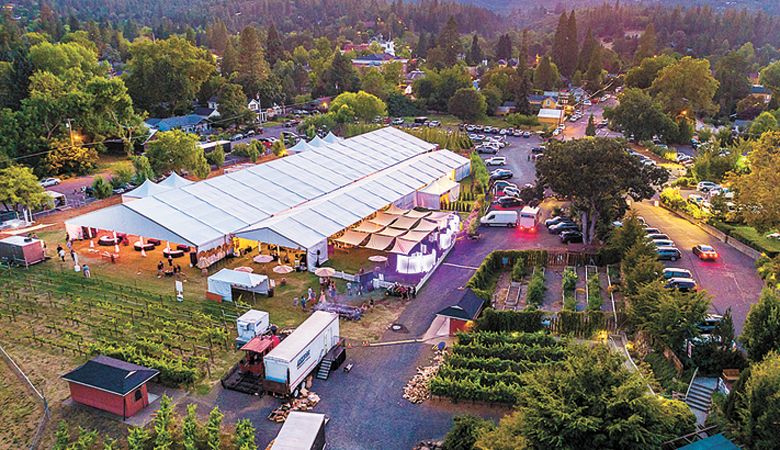 The Oregon Wine Experience under the big tent at Bigham Knoll in Jacksonville. ##Photo by David Gibb