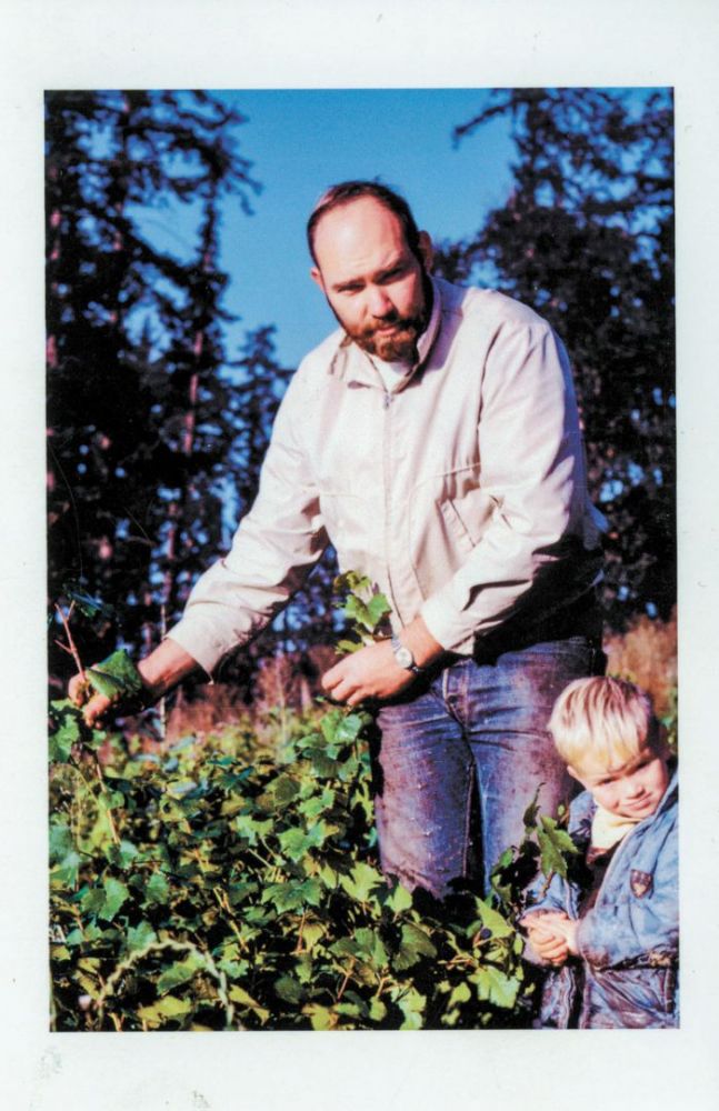 Dick Erath stands with his son, Cal, in the vineyard nursery behind the logger’s cabin on Kings Grade Road in Newberg.##Erath Winery Collection. Jereld R. Nicholson Library, Linfield university. Donated by Dick Erath, 2012