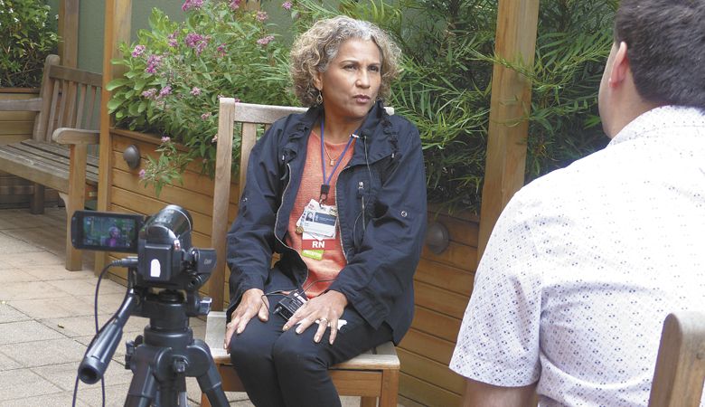 Linfield archivist Rich Schmidt interviews Leda Garside of ¡Salud! Healthcare Services##Photo courtesy of the Oregon Wine History Archive