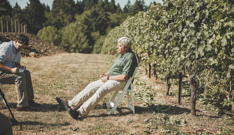 Linfield archivist Rich Schmidt interviews Scott Burns, a professor of geology at Portland State University.##Photo courtesy of the Oregon Wine History Archive