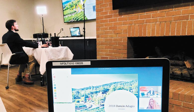 Oregon Wine Experience’s certified sommelier, Joseph Shaughnessy, looks at the screen to review recent virtual classes, which are a part of the Oregon Wine University component of the overall event. These classes are offered year-round. Shaughnessy oversees this portion of OWE; he also facilitates the judges and the competition portion of the event. ##Photo provided