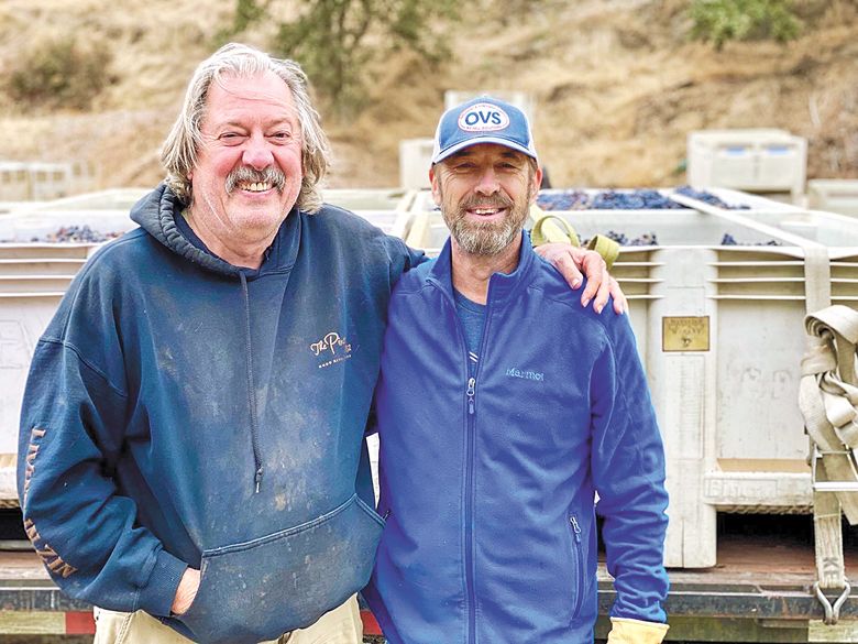 Lonnie Wright, owner of The Pines 1852 Winery and vineyard of the same name, planted between 1890-1900 (left) standing with Boyd Teegarden, winemaker and co-owner of Natalie’s Estate Winery (right).##Photo provided by Natalie’s Estate Winery