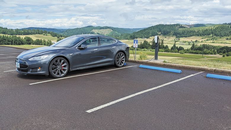 Electric car parked at an EV charging station at King Estate Winery.##Photo provided by King estate Winery