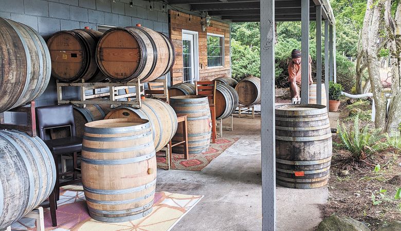 The tasting room at Varmum Vintners in Amity takes care to separate guests using barrels.  ##Photo provided