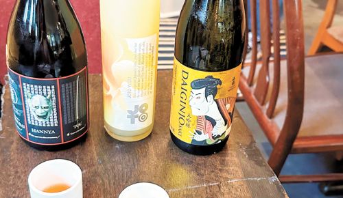 Flight two first provides tasters with a more traditional Daiginjo, then two very unique, unexpected sakés; Joto Yuzu, infused with fruit, and Hannya, infused with plum wine and chili peppers.##Photo by Paula Bandy