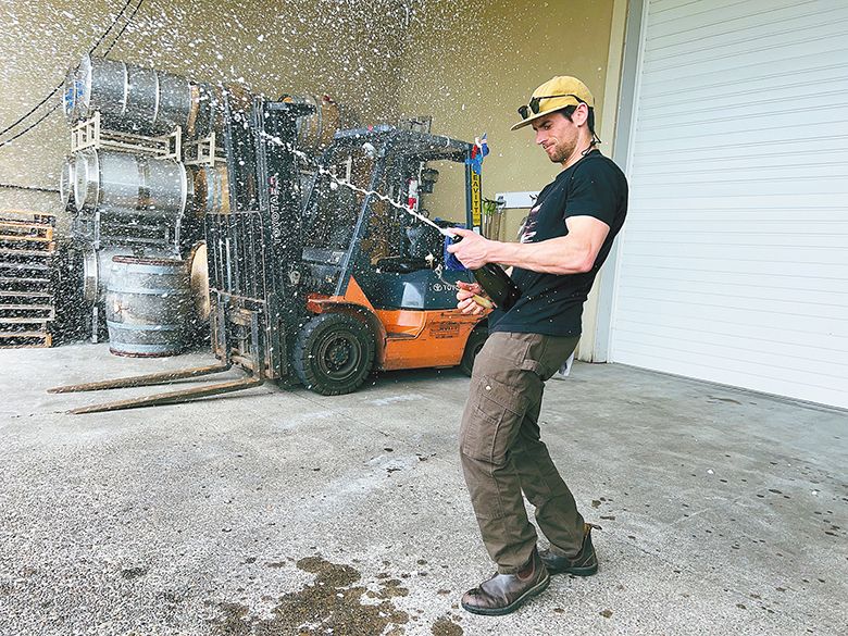 Arabilis cofounder and winemaker Kenny McMahon disgorging a bottle of sparkling wine. ## Photo provided by Method Oregon