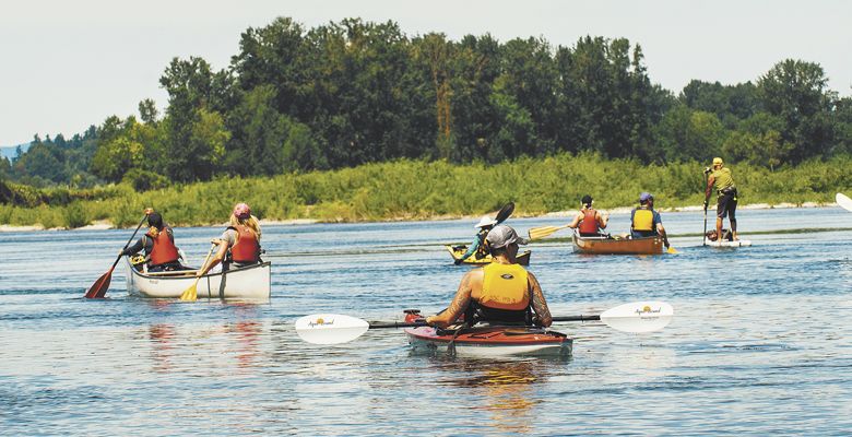 Guests savor the scenery while rowing down the river. ##Photo by Kathyrn Elsesser