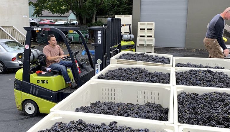 Matt Berson processes fruit during the 2019 harvest at the new Portland Wine Company in Southeast Portland. ##Photo provided