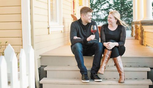 Bryan and Laura Laing, owners of Hazelfern Cellars in Newberg, relax on the porch of their old farmhouse located on the same property as their new winery. ##Photo provided.