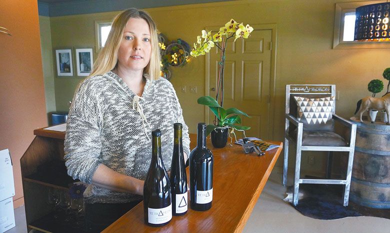 Kelly Johnson sells her wines out of Tetrahedron’s tasting room in Lyle, Washington. ##Photo by Stuart Watson.