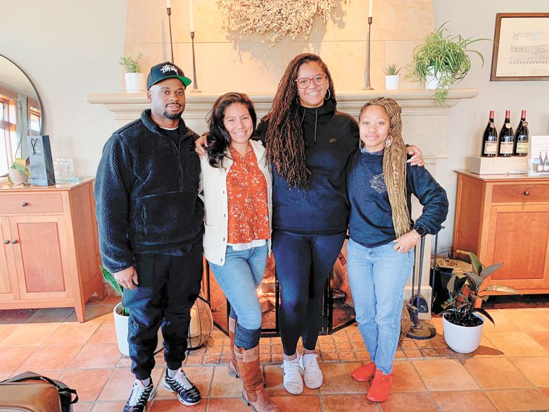 Our Legacy Harvested 2022 interns at the end of their internships, standing with the nonprofit’s founder. From left: Denzel Green, Marcela Alcantar-Marshall, Tiquette Bramlett and Raven Blake. (Intern Dr. Kimberley Dockery is not pictured in the photo.) ##Photo by Patty Mamula