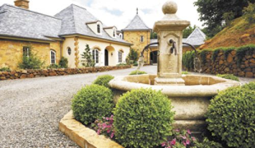 Coming into the courtyard of Domaine Margelle in the Cascade foothills east of Salem is like being magically transported to the French wine country.