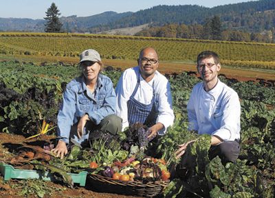 Executive Chef Michael Landsberg (right),
Garden Manager Jessie Russell (left) and Sous
Chef Benjamin Nadolny gather organic produce
from King Estate’s 30 acres of gardens and
orchards.