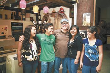 The Olson family includes (from left) Priscilla, 16, Johnny, 21, John, Joy, and
Rebekah, 18. The Olson family includes (from left) Priscilla, 16, Johnny, 21, John, Joy, and
Rebekah, 18.