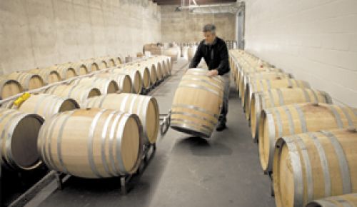 Steve Goff, winemaker for Colene Clemens, prepares a barrel for Pinot Noir in the winery’s state-of-the-art facility.