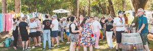 The crowd at this summer s Queer Wine Fest. The event raises money for Wine Country Pride, a Yamhill County-based nonprofit serving the queer and allied communities. ## Photo by Foundry 503