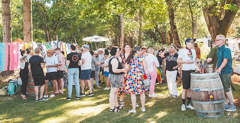 The crowd at this summer s Queer Wine Fest. The event raises money for Wine Country Pride, a Yamhill County-based nonprofit serving the queer and allied communities. ## Photo by Foundry 503