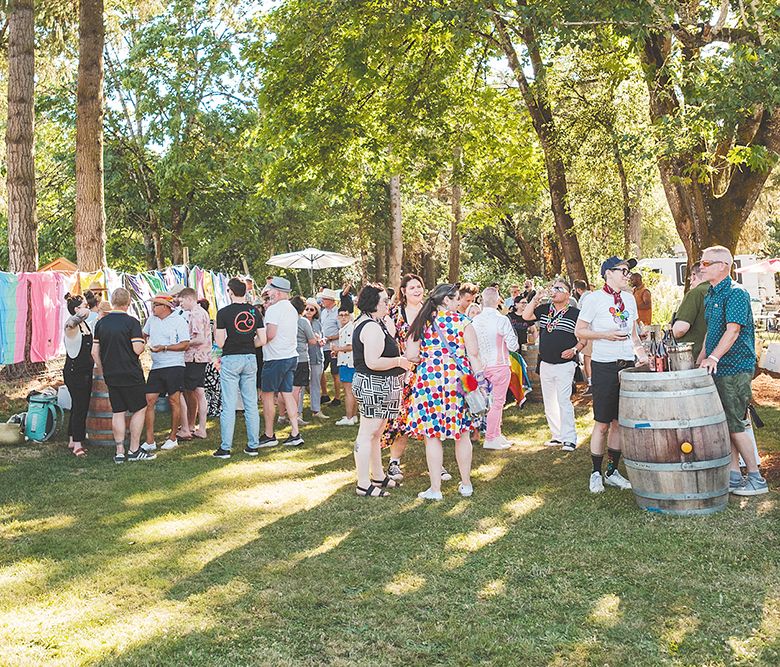 The crowd at this summer s Queer Wine Fest. The event raises money for Wine Country Pride, a Yamhill County-based nonprofit serving the queer and allied communities. ## Photo by Foundry 503