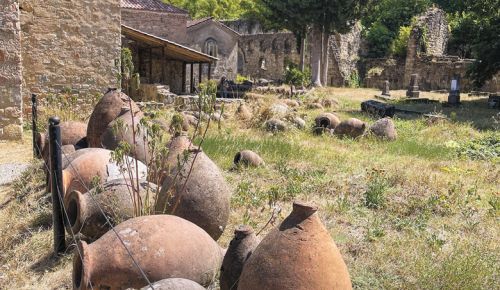 Qvevri vessel graveyard at the Ikalto Monastery. Since it could take a year to produce a qvevri, they weren’t broken up and discarded when no longer useful. ##Photo by Neal d. Hulkower