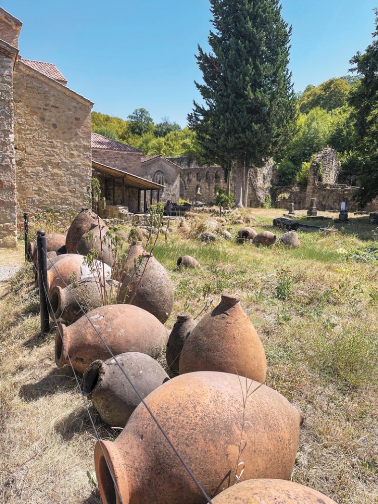 Qvevri vessel graveyard at the Ikalto Monastery. Since it could take a year to produce a qvevri, they weren’t broken up and discarded when no longer useful. ##Photo by Neal d. Hulkower