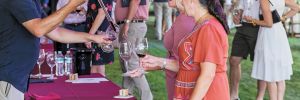 Event guests enjoyed samples of wine straight from the barrel.##Photo by Steven Addington Photography