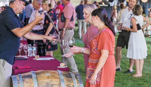 Event guests enjoyed samples of wine straight from the barrel.##Photo by Steven Addington Photography