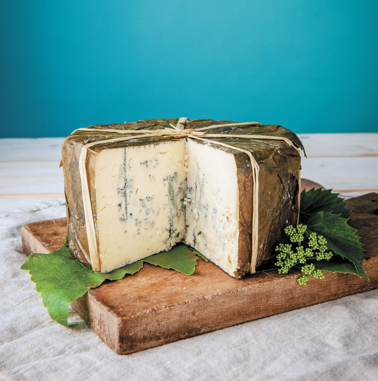 Rogue River Blue, with grape leaves, from Rogue Creamery in Central Point.##Photo by Beryl Striewski