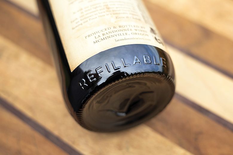 All Revino bottles are embossed with the word “refillable” circling the bottom. ## Photo by Rachel Thompson