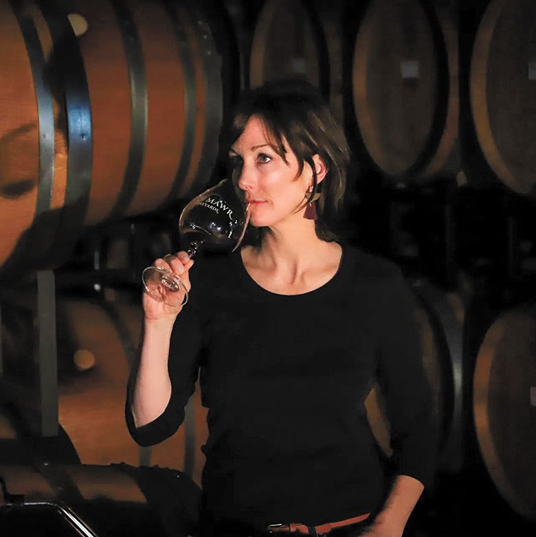 Rachel Rose, Bryn Mawr Vineyards&rsquo; winemaker and vineyard manager, sampling wine. ## Photo by Easton Richmond