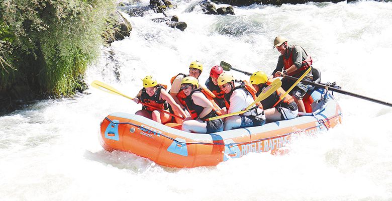A group of rafters on the &ldquo;dip&rdquo; part of the adventure. ## Photo credit: Jade Bansen with Rogue Rafting Company