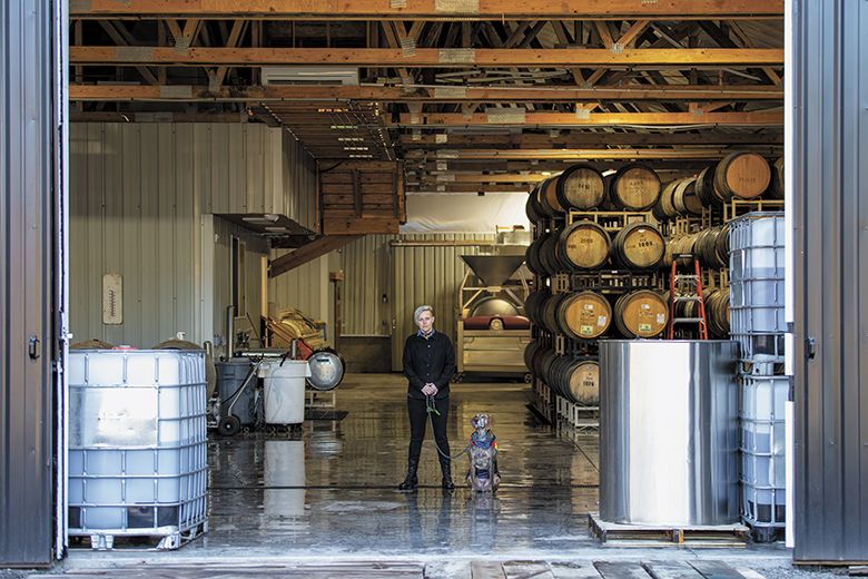 Remy Drabkin, owner of Remy Wines, standing on the carbon-sequestoring concrete floor she helped develop. ## Photo by Nick Hoogendam
