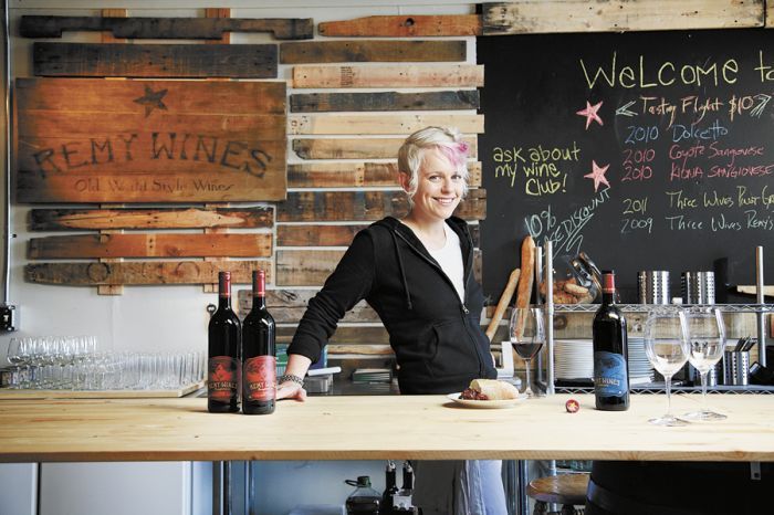 Remy Drabkin hosts behind the bar at baR (pronounced R Bar), Remy Wines’ tasting room located adjacent to the winery in McMinnville. Photo by Ben Garvey. Remy Drabkin hosts behind the bar at baR (pronounced R Bar), Remy Wines’ tasting room located adjacent to the winery in McMinnville. Photo by Ben Garvey.