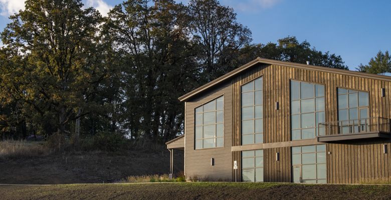 The winery’s aesthetic reflects the surrounding hillsides. ##Photo by Andrea Johnson