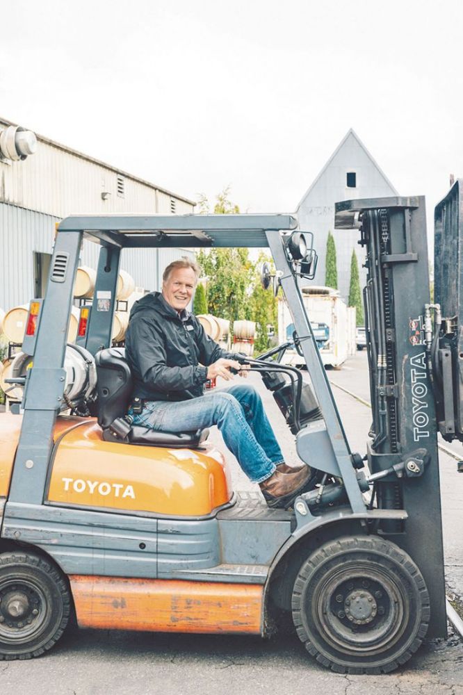 Rob Stuart driving a forklift. ## Photo provided by R. Stuart & Co.