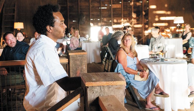 Chef Christian Ephrem speaks to the dinner guests inside the old barn at Dominio IV in Carlton. ##Photo by Shelby Almli