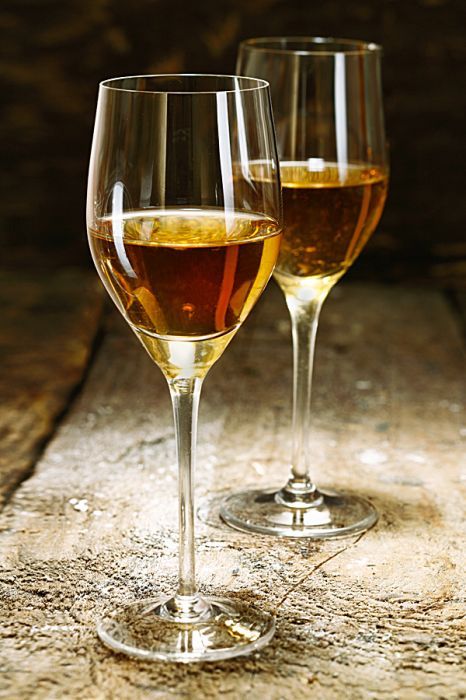 Sherry is produced in a variety of dry styles made primarily from the Palomino grape, ranging from light versions similar to white table wines, such as Manzanilla and Fino, to darker and heavier versions that have been allowed to oxidize as they age in barrel, such as Amontillado and Oloroso. Sherry is produced in a variety of dry styles made primarily from the Palomino grape, ranging from light versions similar to white table wines, such as Manzanilla and Fino, to darker and heavier versions that have been allowed to oxidize as they age in barrel, such as Amontillado and Oloroso.