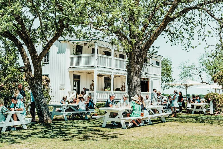 : An old farm house has been renovated into a market, surrounded by plenty of outdoor tasting spaces.##Photo byErica Falbaum