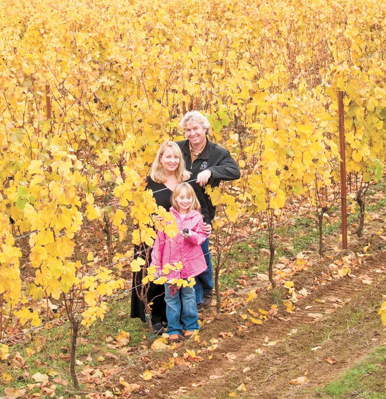 From left to right: Laurent Montalieu (dad), Danielle Andrus (mom), and Soléna Andrus Montalieu (proprietor) after a great harvest for the young winery. This family photo was taken in 2008.##Photo BY Andrea Johnson