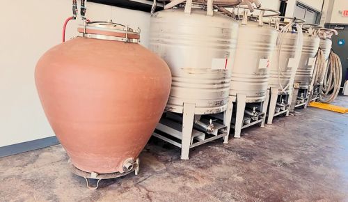 A French Sichuan sandstone amphora sits alongside tanks in Sound & Vision Wine Co.’s production space. ## Photo provided by Sound & Vision Wine Co.