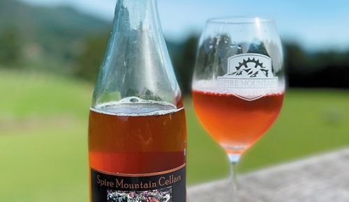 A bottle and glass of Spire Mountain Cellars’ rosé. ## Photo provided by Spire Mountain Cellars