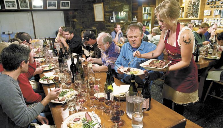 Winemakers enjoy a feast presented by Steamboat Inn during the 2008 Pinot Noir Conference. The legendary dinners are specially prepared with specific wines as guides. ##Photo by Andrea Johnson