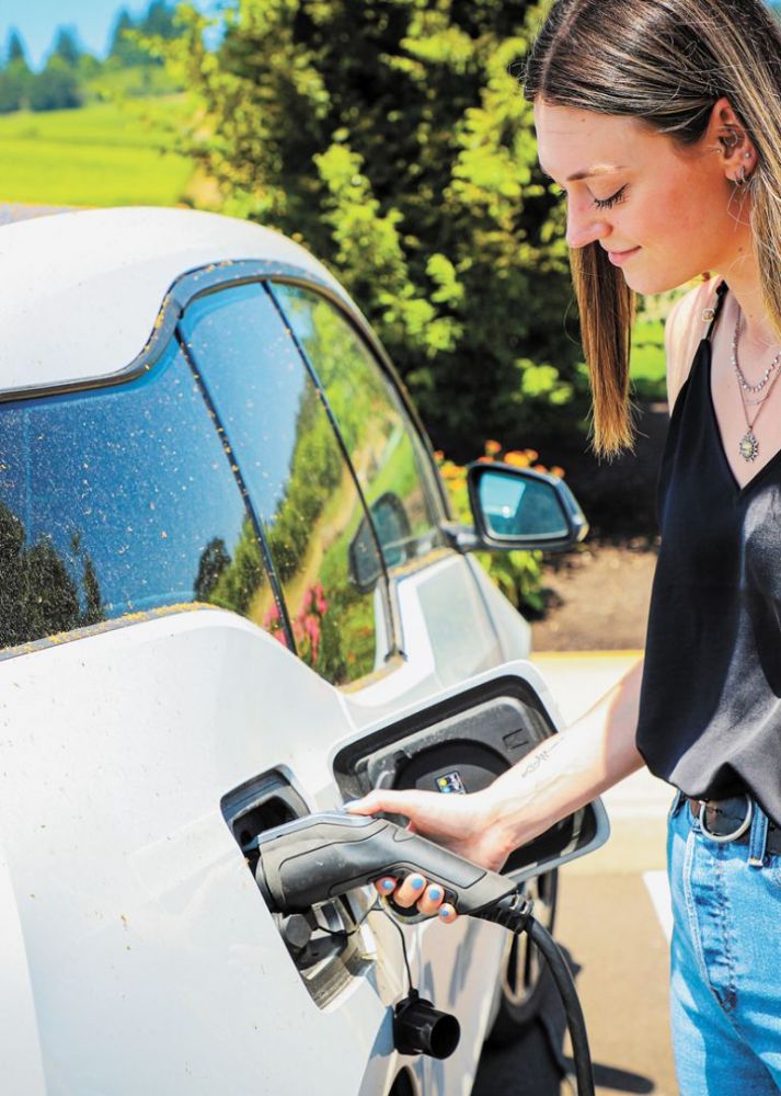 Stoller employee utilizing one of the many charging stations found on the property. ##Photo provided by Stoller Family Estates Stoller employee utilizing one of the many charging stations found on the property. ##Photo provided by Stoller Family Estates