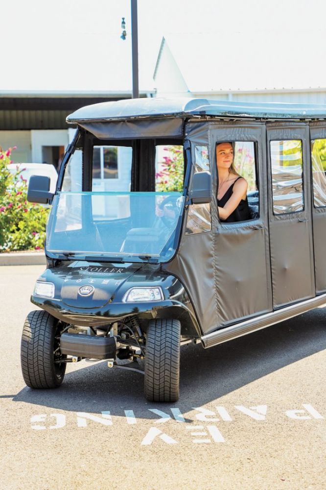 The tasting room team at Stoller use two EV golf carts for vineyard tours and shuttling guests around the campus.##Photo provided by Stoller Family Estates