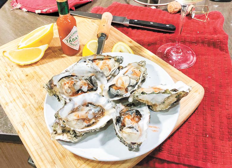 Upper Five Vineyard’s Terry Sullivan celebrates Valentine’s Day with oysters and Underwood Bubbles.##Photo provided by Upper Five Vineyard